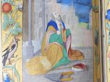 an open book with a picture of a woman and a cat on it