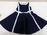 navy and white dress with white trim