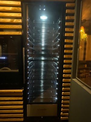 a glass door that has a bunch of lights on it