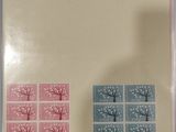 a picture of a set of stamps with trees on them