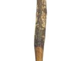 a wooden stick with a handle hanging from it ' s end