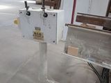 a machine that is sitting in a warehouse