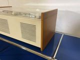 a radio sitting on top of a blue counter
