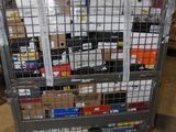 a metal cart with many boxes on it in a warehouse