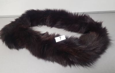 an image of a fur collar with a tag on it