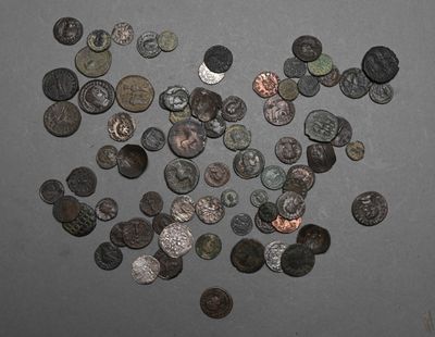 a lot of coins that are on the table