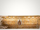 an old wooden box with a painting of a woman on it