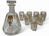 vintage glass decanter set with six shot glasses and a decanter