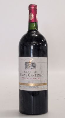 a bottle of wine that is sitting on a table