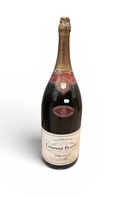 a bottle of wine that is sitting on a table