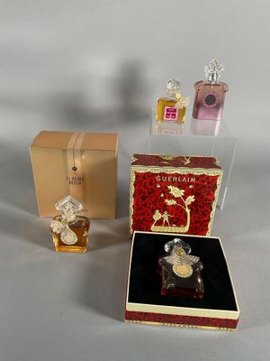 a small box with a perfume bottle and a small box with a perfume bottle
