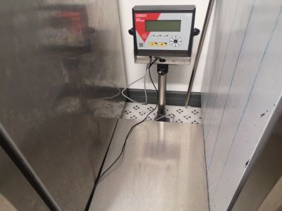 an image of a digital scale in a room