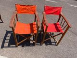 three chairs sitting in the middle of the street