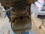 a close up of a machine that is being worked on