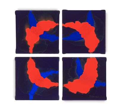 four square coasters with red and blue birds on them