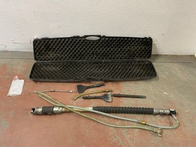 a case that has tools in it on the floor