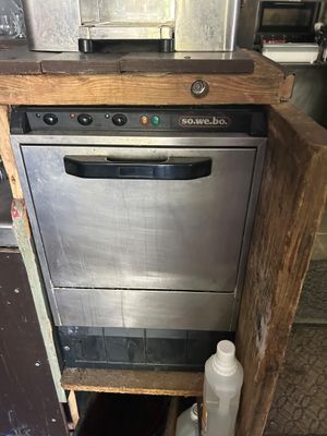 an image of a dishwasher that is in a kitchen