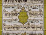 une image représentant une écharpe jaune et blanche sur laquelle figure une ville
