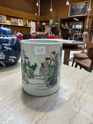 a vase that is sitting on a table in a room