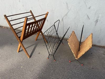 two chairs that are next to each other on the street