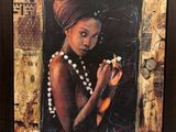 tableau représentant une femme coiffée d'un turban, tenant une cigarette