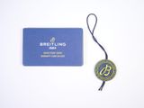 a badge with a name on it next to a lanyard