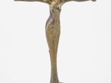 an image of a bronze statue of a woman holding a candle