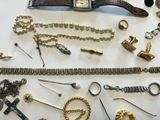many different types of jewelry on the table