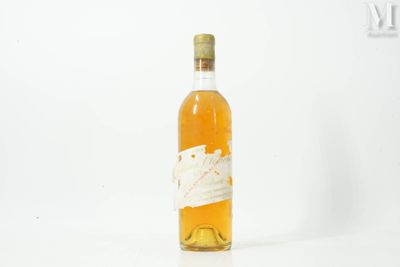 a bottle of wine that is sitting on a table