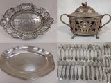 many different types of silverware and silverware on display