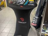 a black table with a hat on it in a store