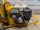 a small machine that is sitting on the ground