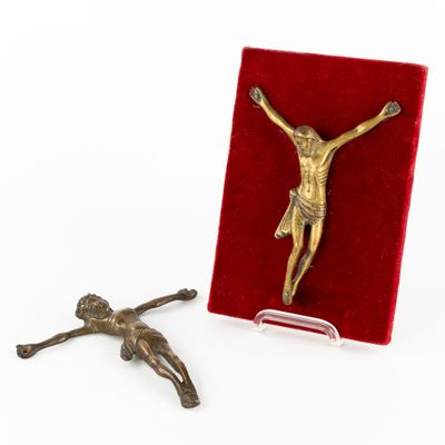 an image of a crucif with a red velvet case and a cross