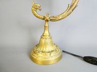Lampe de chevet en bronze à enroulement et décor d'une tête … (photo 2)