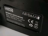 an image of a close up of a black electronic device on a table