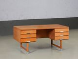 a wooden desk with two drawers in a room