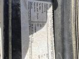 an image of a close up of a car ' s tire with a label on it