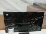 une photo d'un téléviseur à écran plat posé sur une table