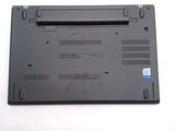 a laptop that is sitting on a white surface