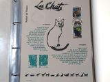 a picture of a book with a picture of a cat on it