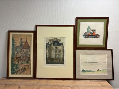 four framed pictures hanging on a wall above a table