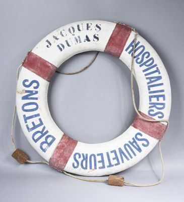 a life preserver that is hanging on the wall