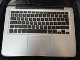 a laptop computer that is sitting on a table