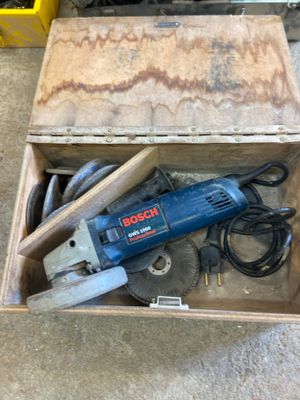 a box with tools inside of it on the floor