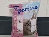 a bag of cat food sitting on a counter