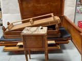 several pieces of furniture are stacked on top of each other in a room