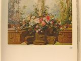 an open book with a picture of flowers in a vase on a table