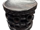 a black stool with a wooden top on a white background