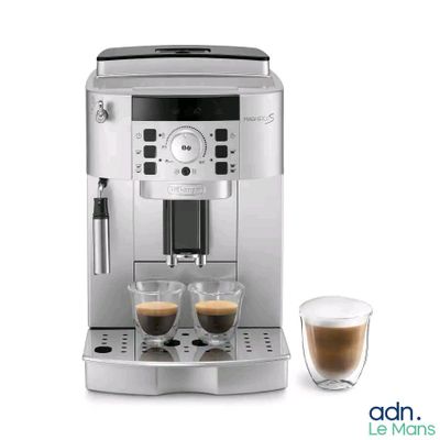 a close up of a coffee machine with two cups of coffee