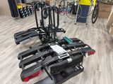 many bikes that are sitting on top of each other